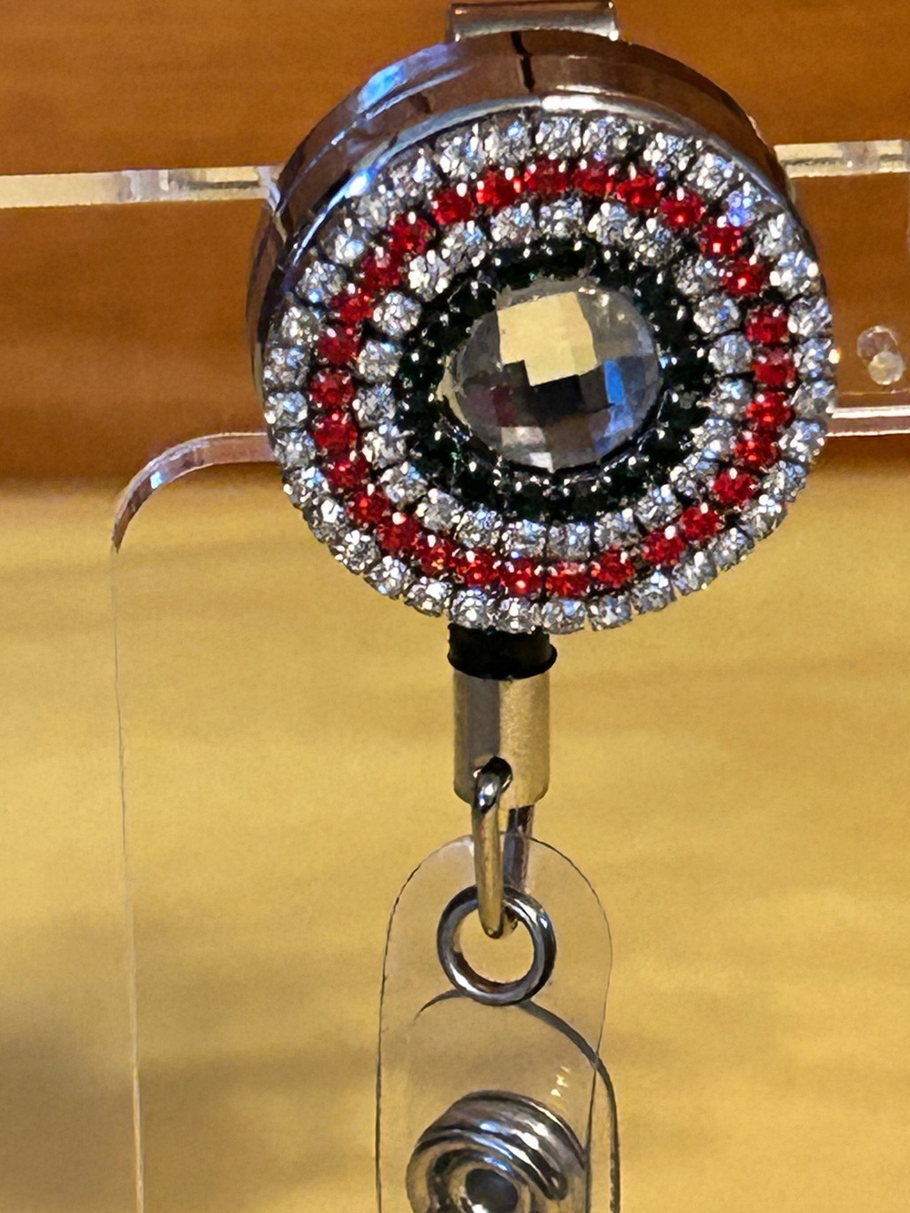 Crystal Circle Badge Reel with Red and Silver Accents